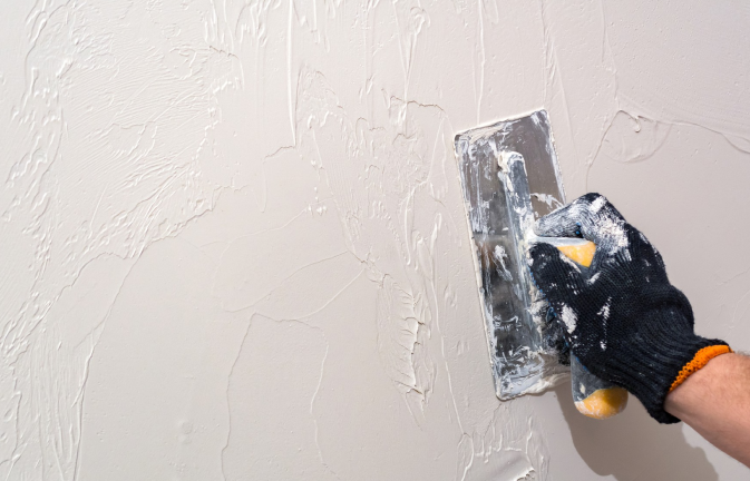 Modifier for repairing plaster, concrete & mortar